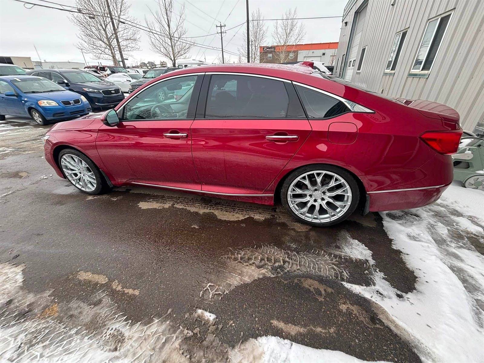 Red Honda Accord on hyper silver mesh wheels